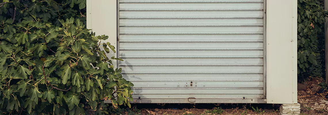 Overhead Garage Door Water Damage Repair in Georgetown, Ontario