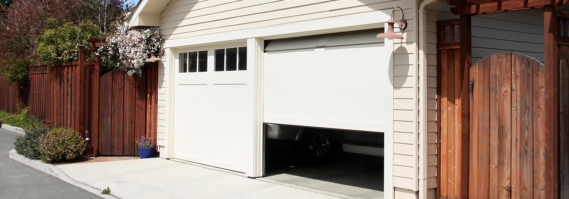 Fix Metal Garage Door Jerking in Georgetown, Ontario